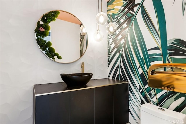 bathroom with vanity and toilet