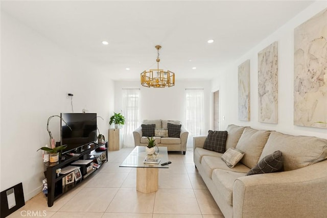 tiled living room with an inviting chandelier