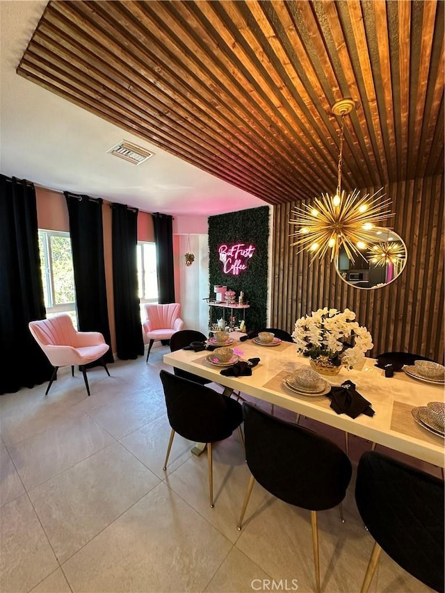 dining room with a notable chandelier