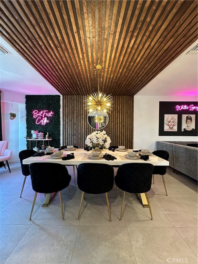 dining space with a notable chandelier