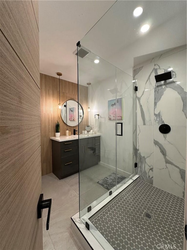 bathroom featuring vanity and walk in shower