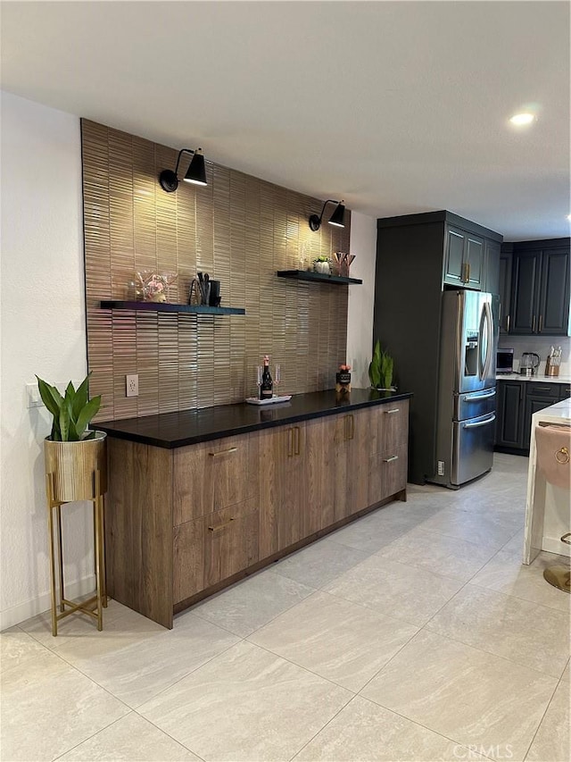 bar with stainless steel fridge with ice dispenser