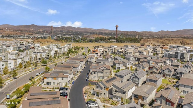 drone / aerial view featuring a mountain view