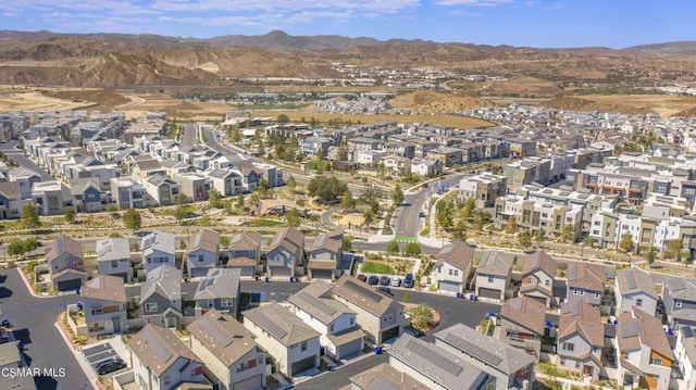 drone / aerial view featuring a mountain view