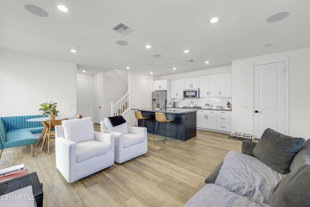 living room with light wood-type flooring