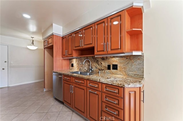 kitchen featuring decorative light fixtures, stainless steel dishwasher, decorative backsplash, sink, and light tile patterned flooring