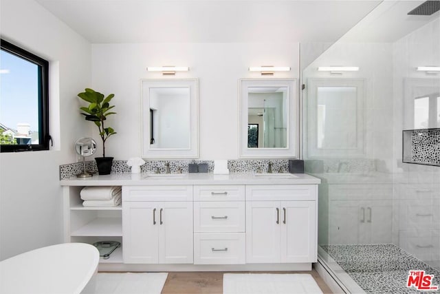 bathroom with vanity and an enclosed shower