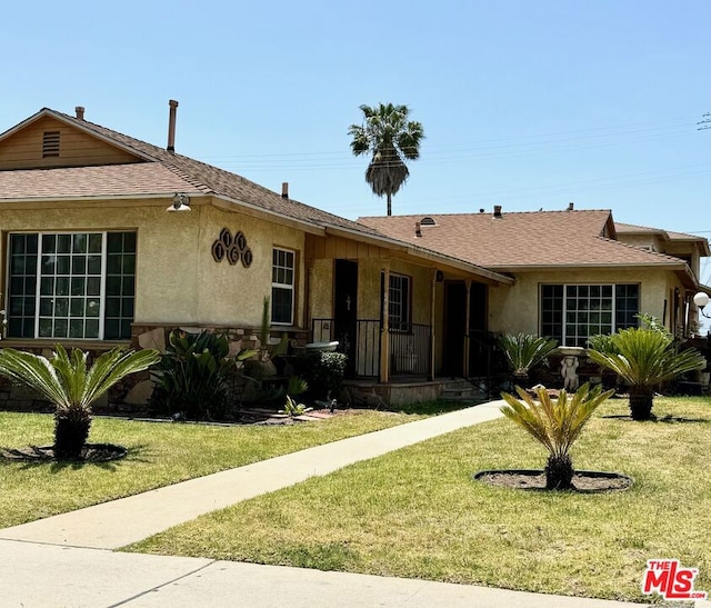 single story home with a front yard