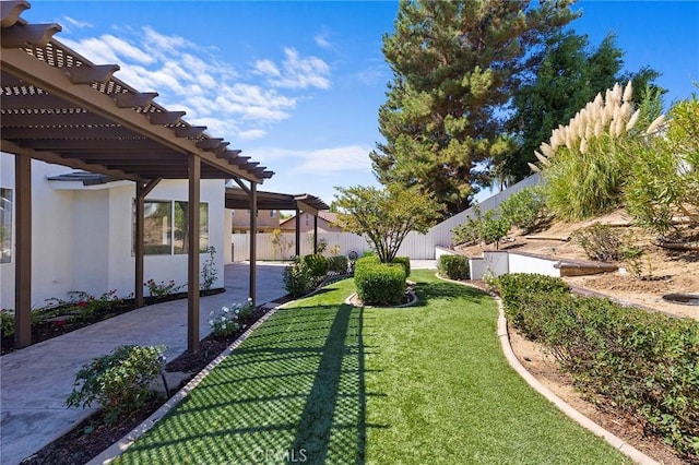 view of yard featuring a pergola and a patio area