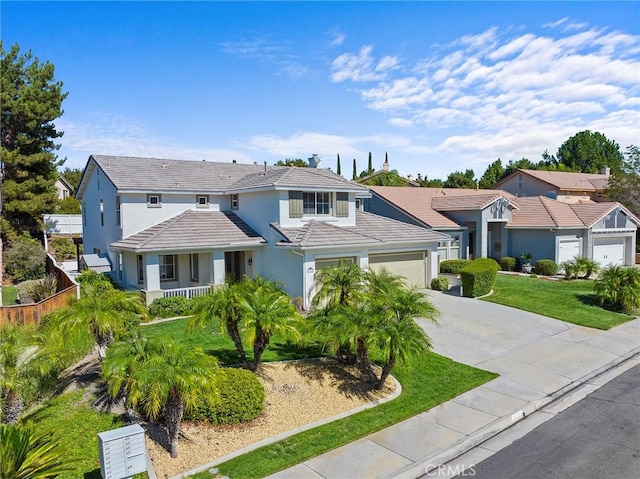 view of front of home with a garage and a front yard