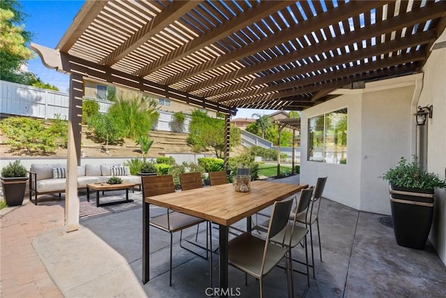 view of patio with a pergola and an outdoor living space