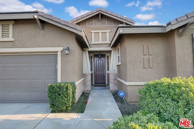 entrance to property with a garage