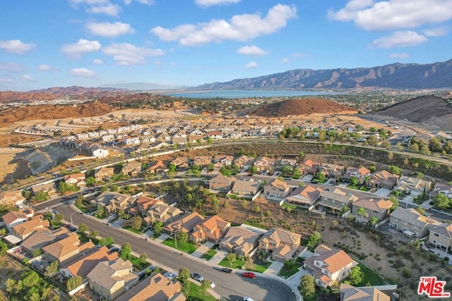 drone / aerial view featuring a mountain view