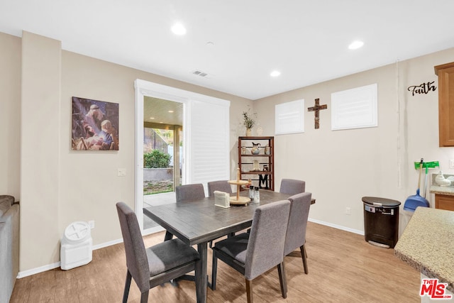 dining room with light hardwood / wood-style floors