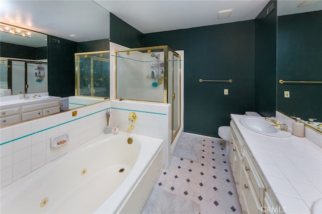 full bathroom with toilet, vanity, and separate shower and tub