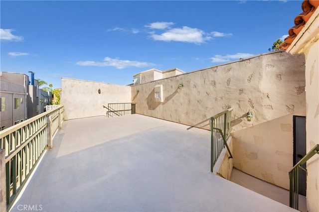 view of patio with a balcony