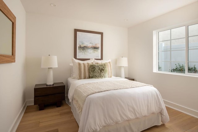 bedroom featuring light hardwood / wood-style flooring