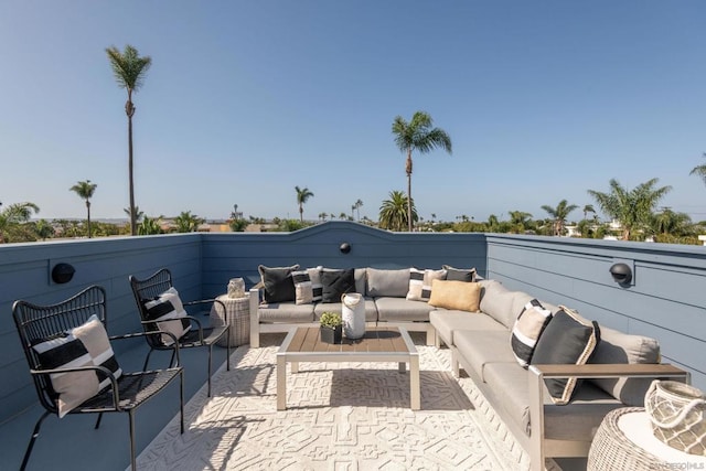 view of patio / terrace featuring an outdoor living space and a balcony