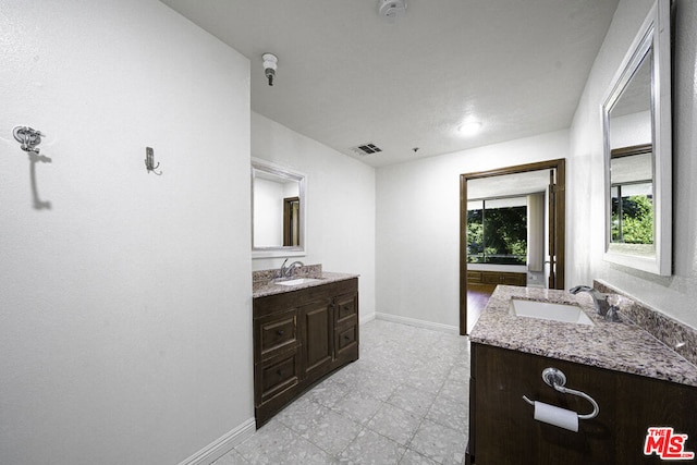 bathroom featuring vanity