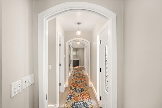 hallway featuring light hardwood / wood-style flooring