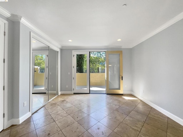 tiled empty room with french doors and crown molding