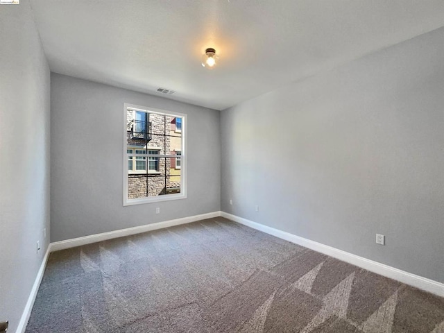 view of carpeted spare room