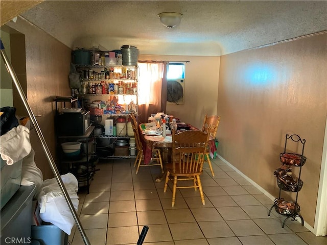 dining area featuring tile patterned flooring