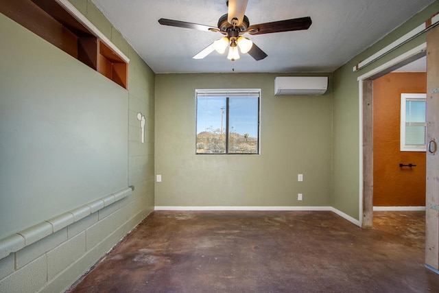 unfurnished room featuring ceiling fan and a wall mounted AC