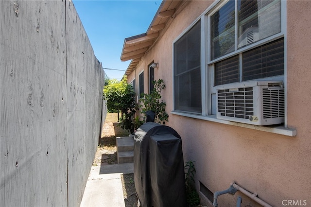 view of property exterior featuring cooling unit