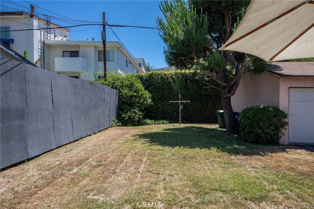 view of yard featuring a garage