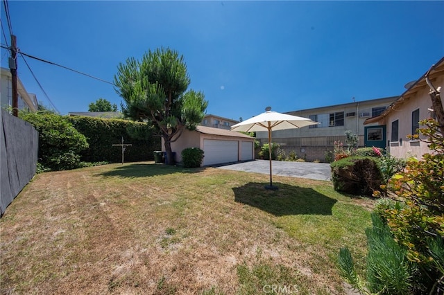 view of yard featuring a garage