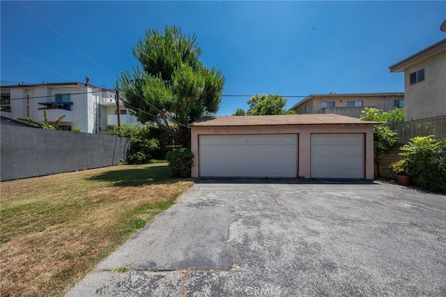 garage featuring a yard