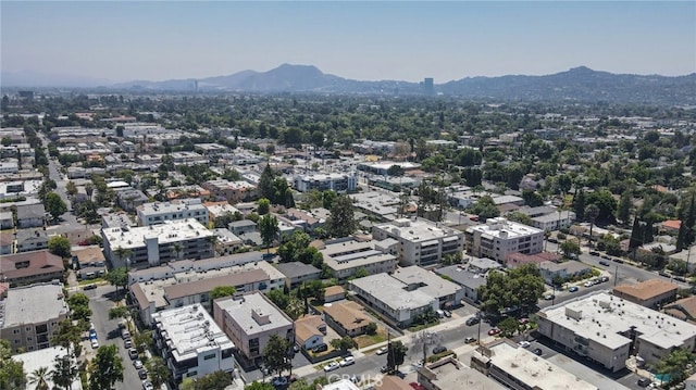 drone / aerial view featuring a mountain view