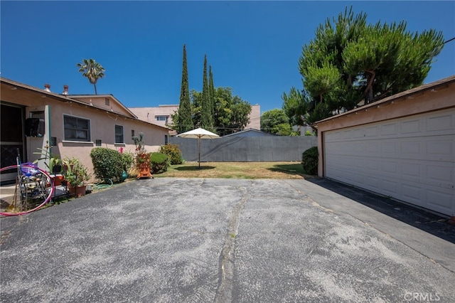 view of patio / terrace with a garage