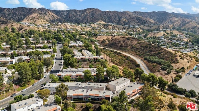 bird's eye view with a mountain view