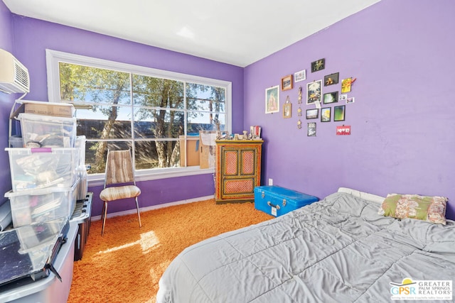 carpeted bedroom featuring a wall unit AC and multiple windows