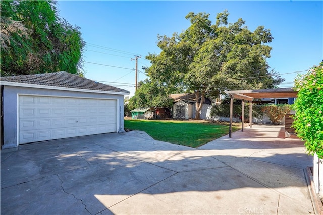 garage with a yard