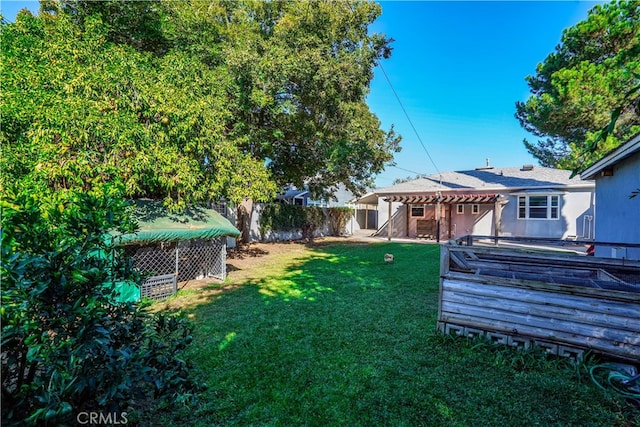 view of yard with a wooden deck