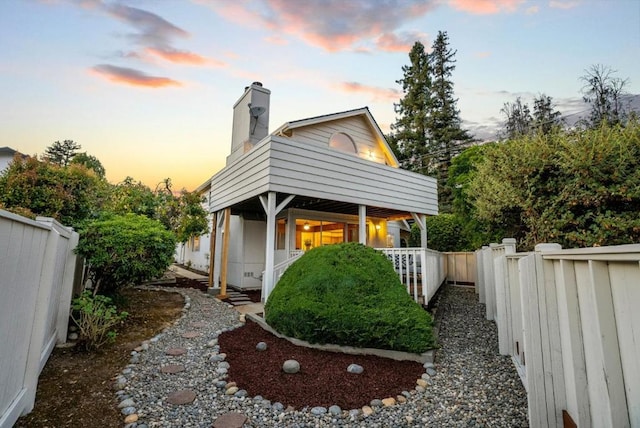 view of property exterior at dusk