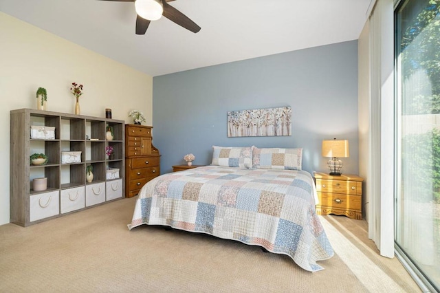 bedroom featuring ceiling fan and light carpet