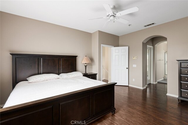 bedroom featuring dark hardwood / wood-style flooring and ceiling fan