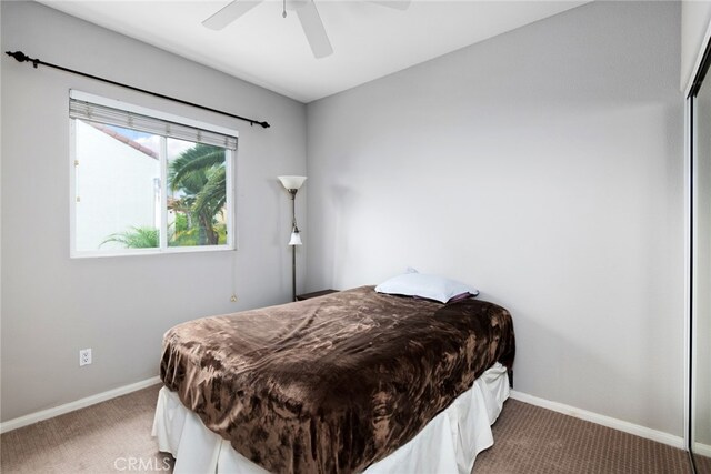 bedroom with carpet flooring and ceiling fan