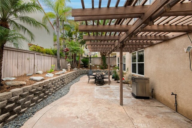 view of patio featuring a pergola