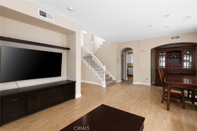 living room with light hardwood / wood-style floors