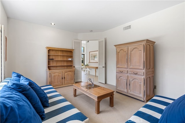 living room with light colored carpet