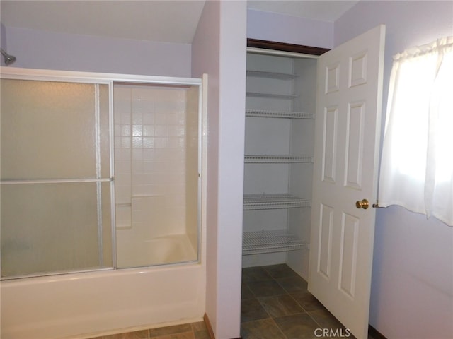 bathroom featuring enclosed tub / shower combo