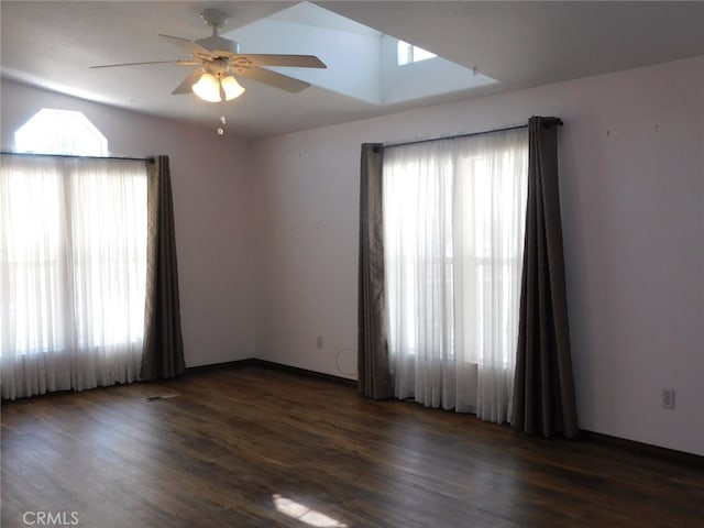 unfurnished room featuring dark hardwood / wood-style flooring and ceiling fan