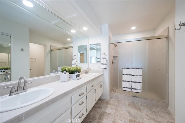 bathroom featuring vanity and walk in shower