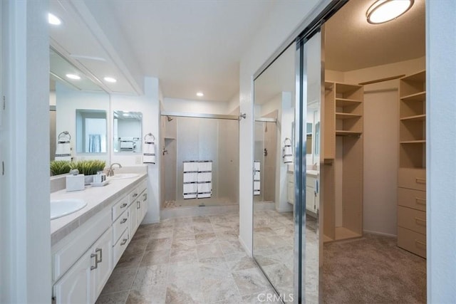 bathroom featuring vanity and walk in shower