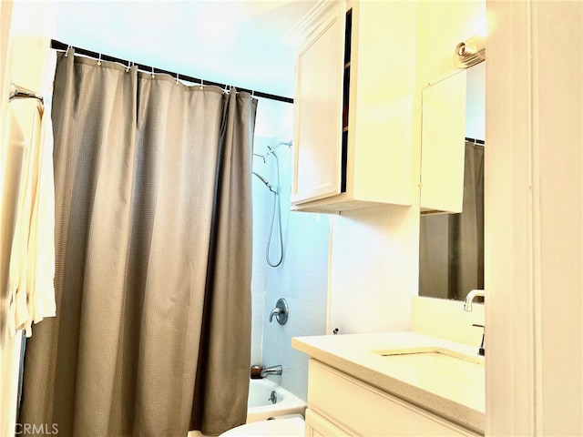 full bathroom featuring vanity, toilet, and shower / bath combo